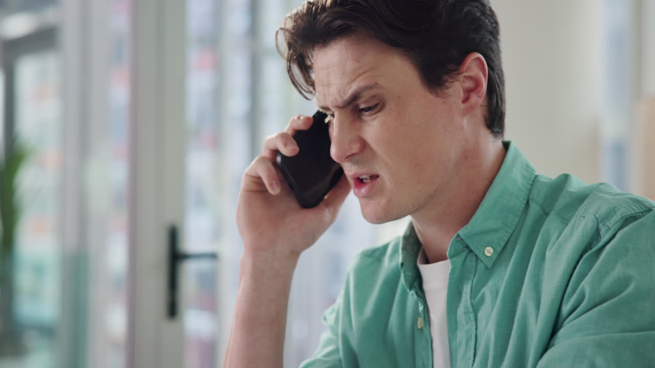 Concerned man on a phone call