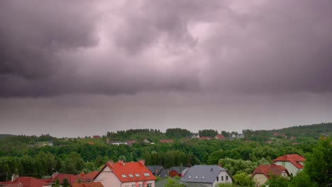 gray clouds moving over kolbudy village in pomeranian district