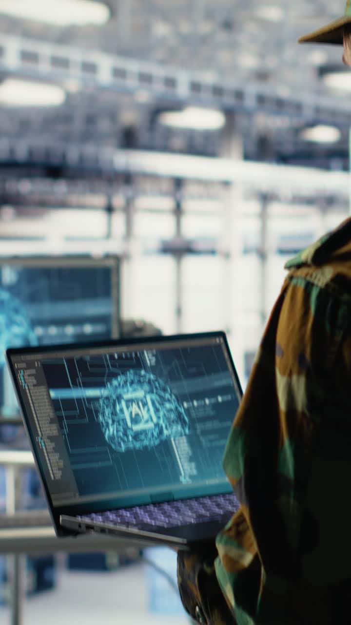 Vertical Video Soldier In Engineering Role Uses Ai On Laptop To Manage Server Hub Systems