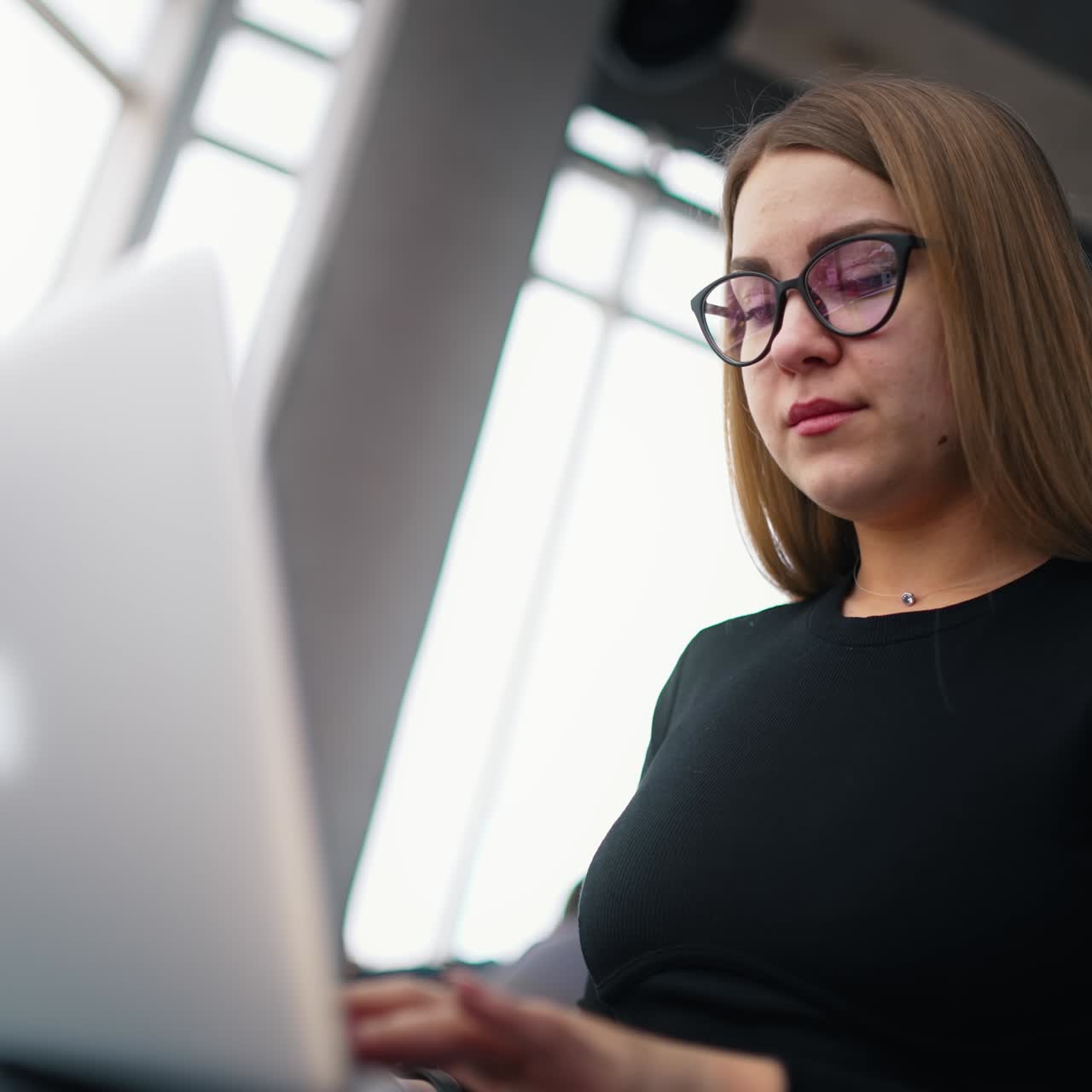 cheerful businesswoman at home office working on computer