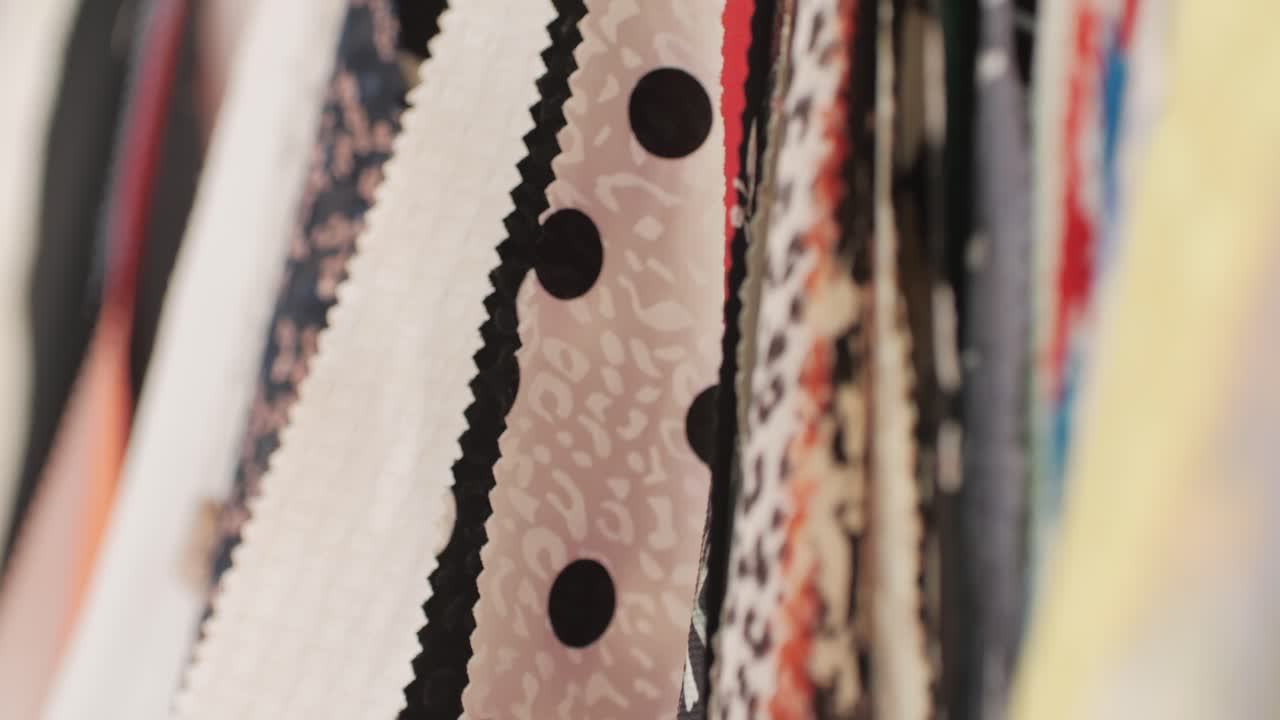 Fabric samples textile in market shop, colorful palette cloth accessories interior design, shopping choosing color tone textile in shop atelier