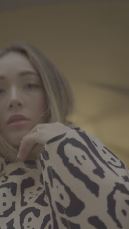 stylish woman in leopard print sweater