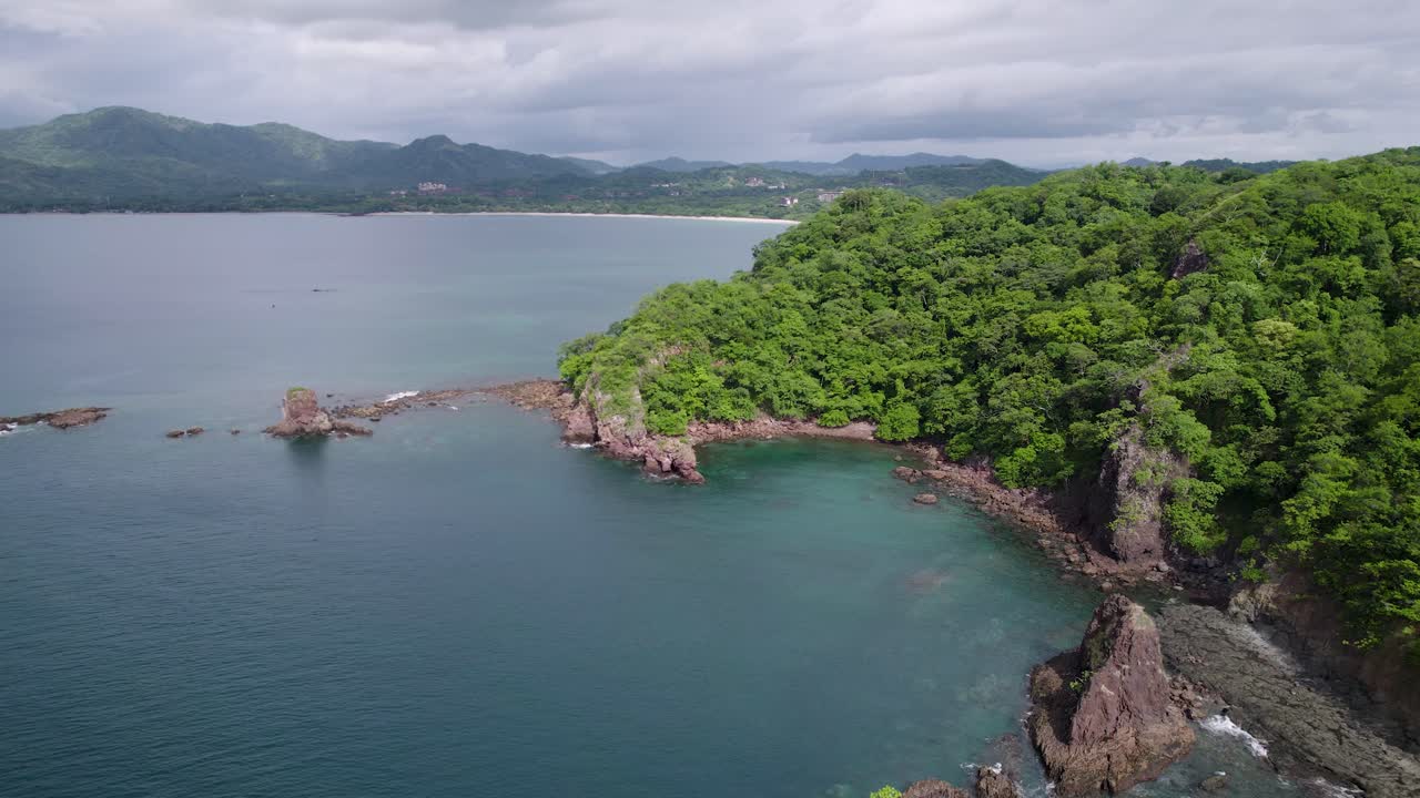A 4K drone shot of Punta Sabana Point and the Mirador Conchal Peninsula next to Puerto Viejo and Playa Conchal, or &ldquo;Shell Beach&rdquo;, along the north-western coast of Costa Rica
