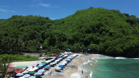 a hot sunny day at crystal bay in nusa penida island in indonesia