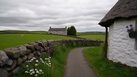 picturesque rural landscape with traditional thatched cottage and green fields