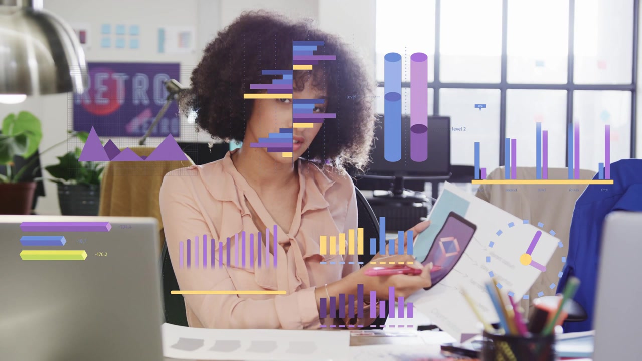 Woman tapping tablet and pointing at printed pages, animating colorful charts for design review