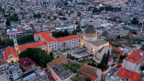 Aerial-footage-of-the-Basilica-of-the-Annunciation-over-the-old-city-houses-of-Nazareth