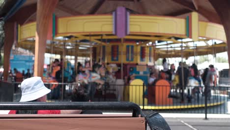 carousel spinning with kids on it