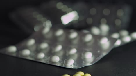 slide shot of blisters with pills. infection control concept. covid 2019.scene d.