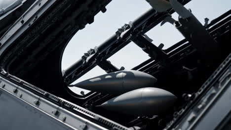 close-up view of a fighter jet and its weaponry