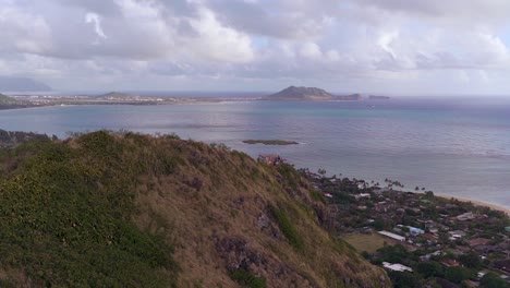 beautiful hawaii beach overlook hike with a couple of pillboxes at the very top