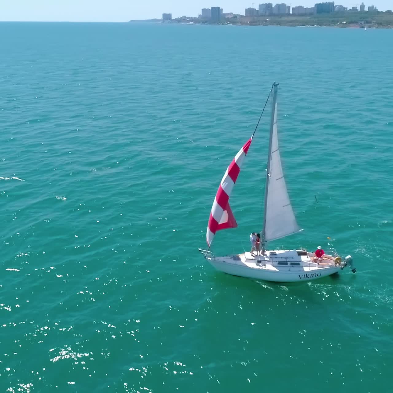 Sailing boats in the sea. Aerial drone view of floating sailing yachts in sea