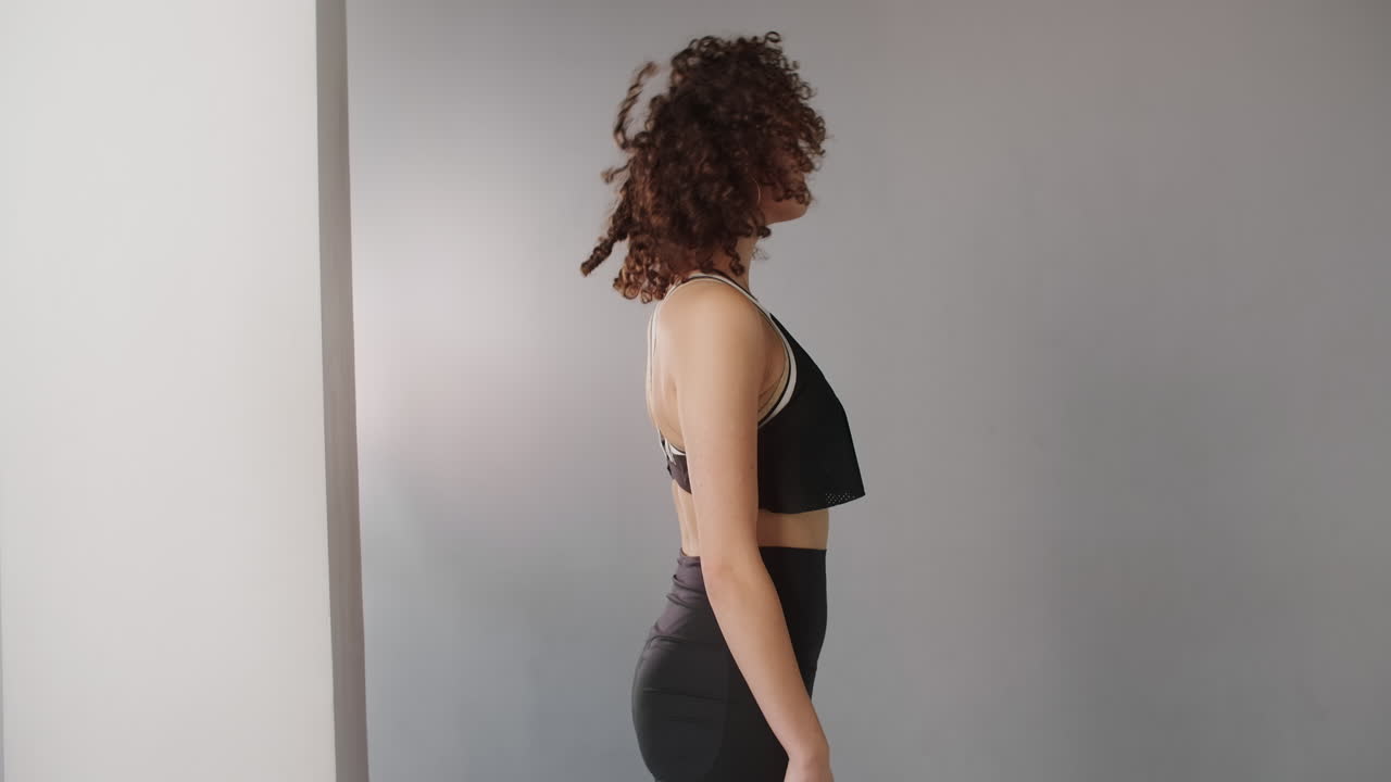 Woman Performing Yoga Poses