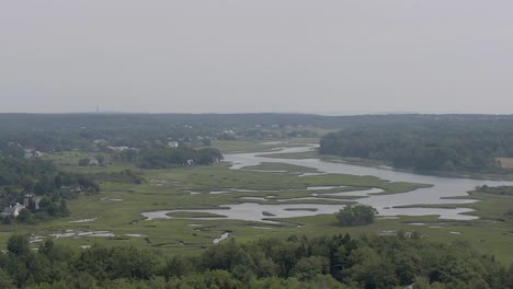 drone flying over marsh in scarborough, maine