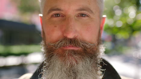 Portrait of a serious man with a full beard