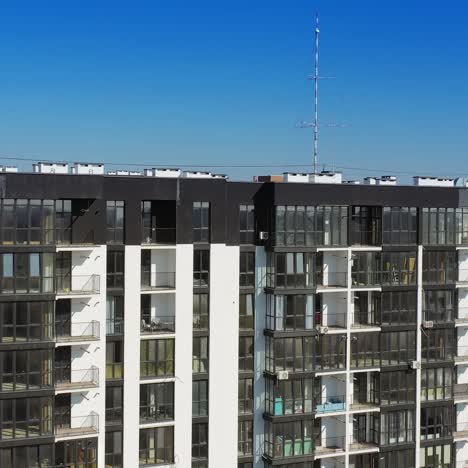 modern residential area in city. aerial view of contemporary apartment building with large windows