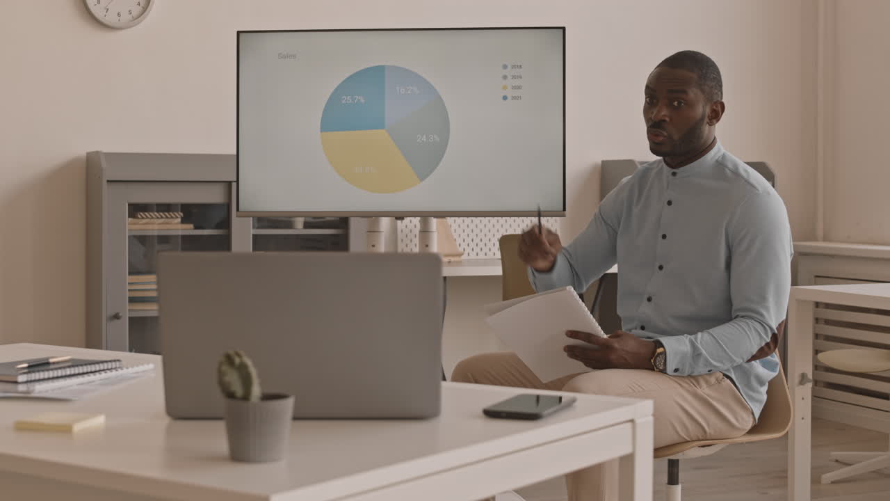 African Office Worker Having Video Conference
