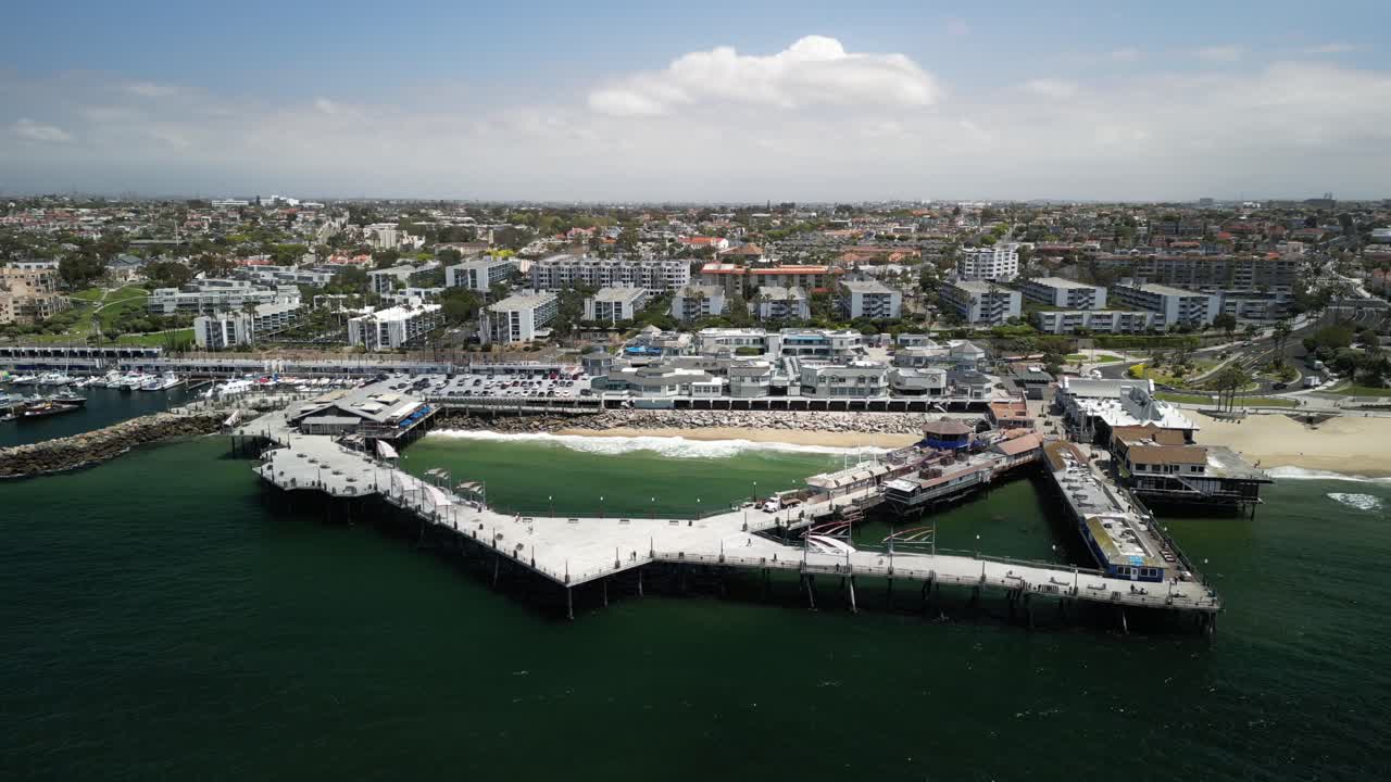 Aerial 4K drone footage of Redondo Beach Pier in Los Angeles, California, showcasing the Pacific Ocean, coastline, marina, and iconic waterfront landmark from scenic elevated views