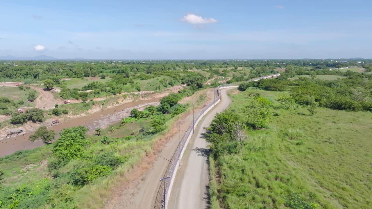 Drone aerial shot of border fence between Haiti and the Dominican Republic near Dajabón