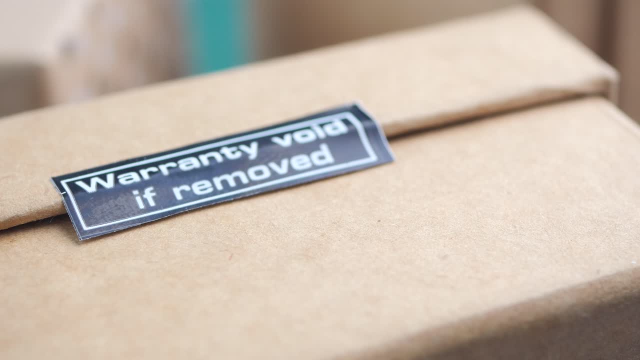 Warranty Void Label on Cardboard Box