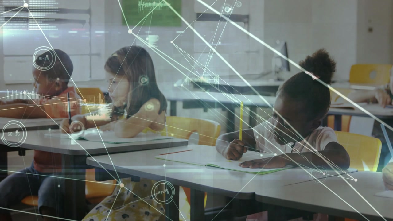 Students writing worksheets for class while camera sliding right, overlay shifting over students