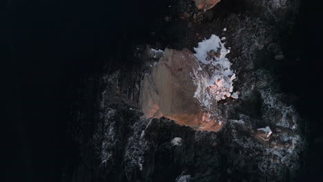 cinematic drone shot of famous perce rock in quebec, canada