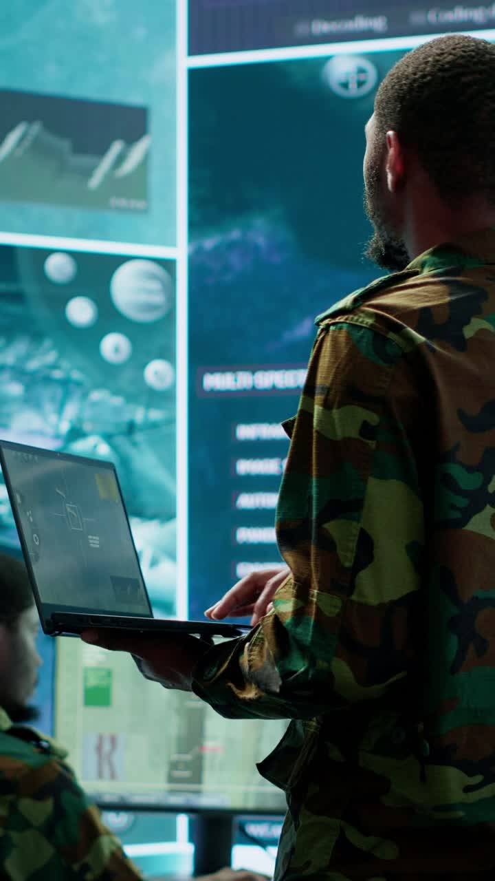 Vertical Video Team of military specialists operate in a secret service command post