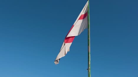 flag of genova flapping in the wind