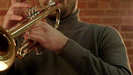 man playing trumpet