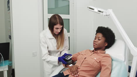 doctor examining patient in a clinic