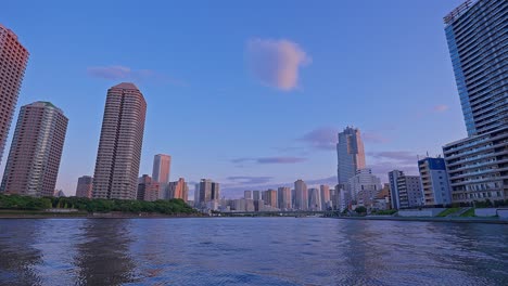 evening tokyo, tsukuda, toyosu skyscrapers and bridge the sumida river