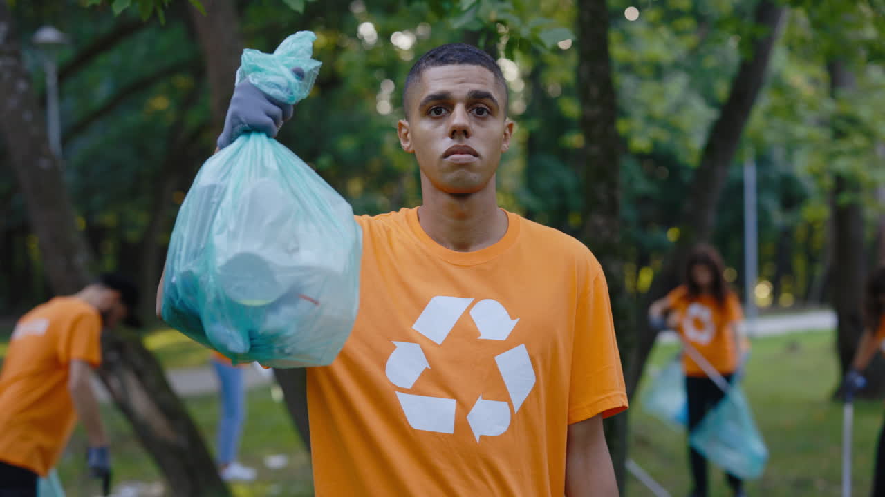 Man volunteering in park cleanup