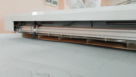 cnc machine for cutting fabrics textile materials and leather, laser marking and measurement. modern footwear production.