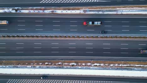 On-a-winter-day,-an-aerial-view-captures-the-Qingdao-Yinchuan-Expressway-in-Shandong-Province,-China