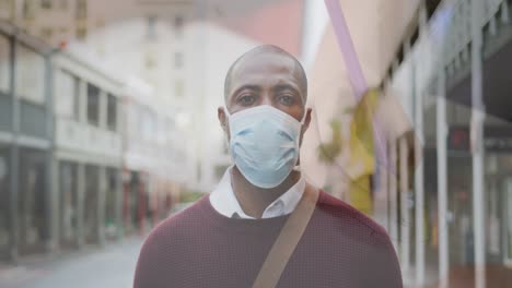 Composite-video-of-african-american-man-wearing-face-mask-against-student-studying-at-school