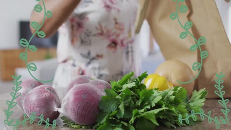 animation of plant icons over caucasian woman with vegetables