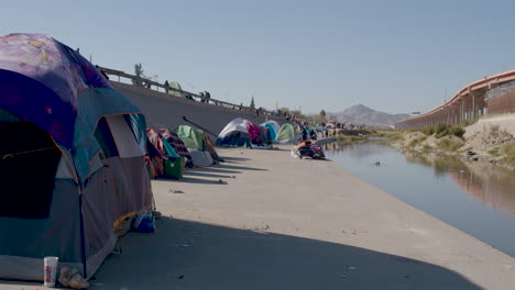 immigrants camping along the us-mexico border