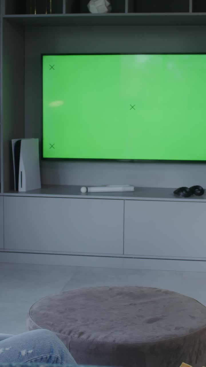 Living room with green screen TV