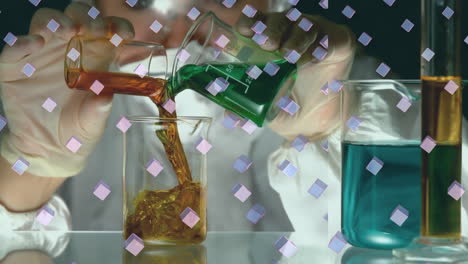 animation of rows of purple cubes over scientist pouring liquid into laboratory beaker