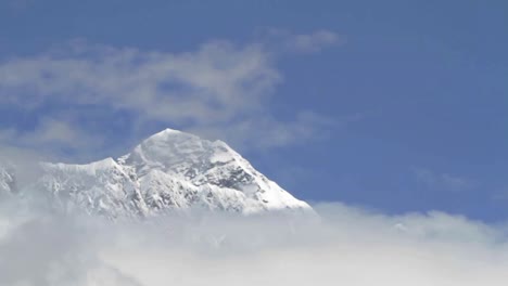 summit of everest surrounded by cloud