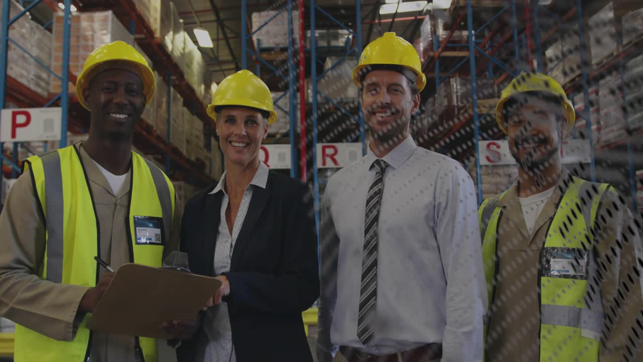 Lead checking clipboard, briefing team in warehouse, dotted overlay partly obscuring helmets, racks