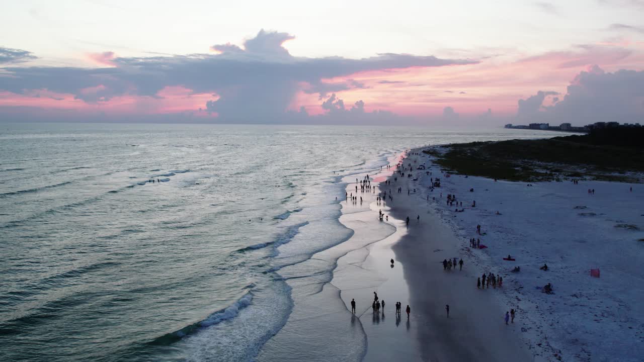 Beautiful Florida sunset in Sarasota. Aerial shot of coastline, horizon. 60 fps