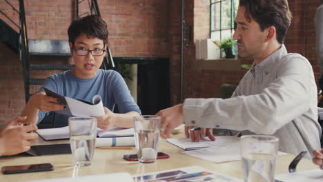 steadicam shot in of diverse business team meeting