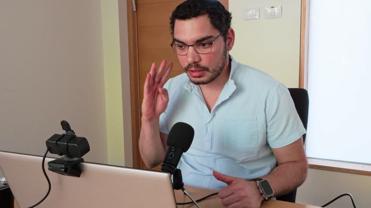 Young Businessman Leading Zoom Meeting