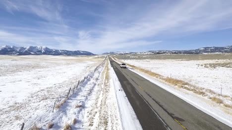 Drone-follows-white-truck-in-middle-of-nowhere