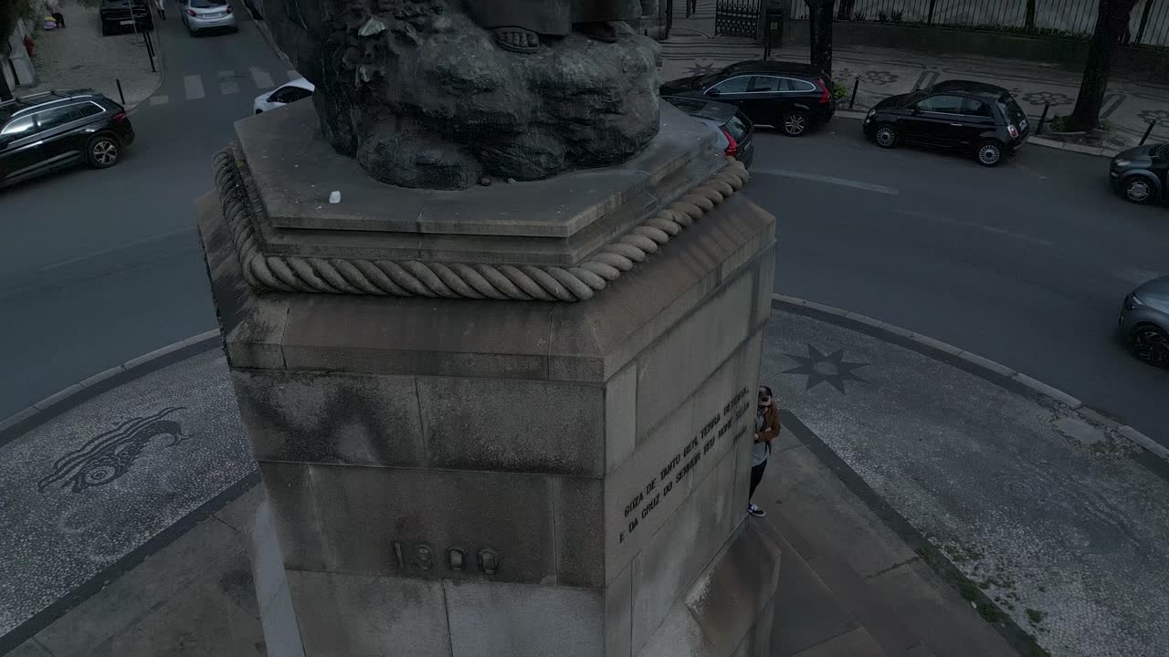 Aerial bottom up view of central square which includes the statue of Pedro &Aacute;lvares Cabral and sign that welcomes people in Lisbon