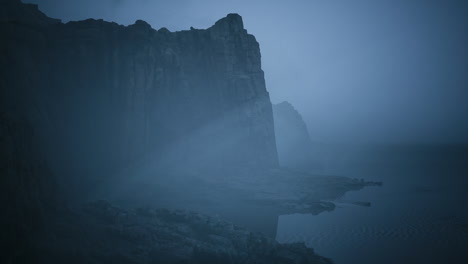 mysterious coastal cliffs shrouded in fog during twilight hours