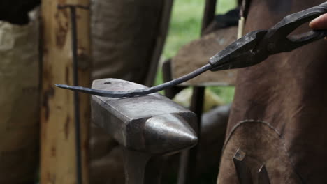 blacksmith forges iron