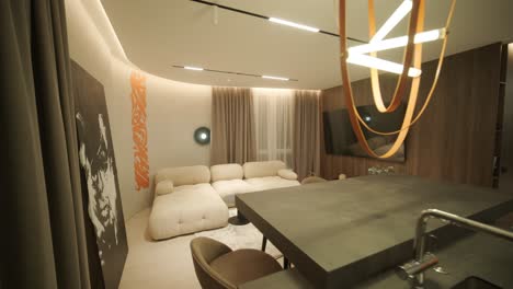 stylish and elegant minimalist home interior featuring clean lines, neutral colors, and warm ambient lighting, creating a cozy and modern atmosphere.