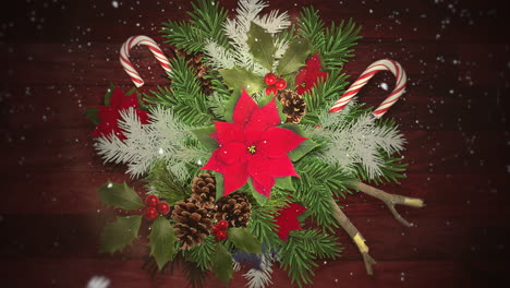 primer plano animado copos de nieve blancos en dulces y ramas verdes de navidad 1